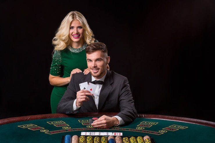 ernita platform interface showing sports betting markets and live-dealer game lobby on mobile phone